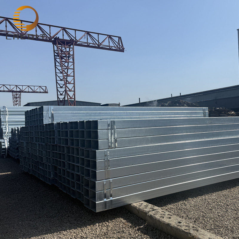 galvanized‑steel‑pipe‑square‑tube‑stock‑with‑crane‑background